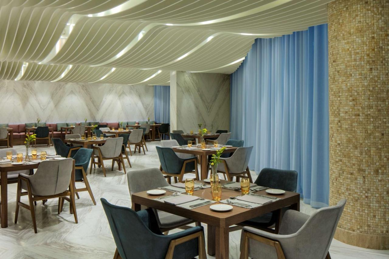 Radisson Blu Hotel Apartment Dubai Silicon Oasis Esterno foto